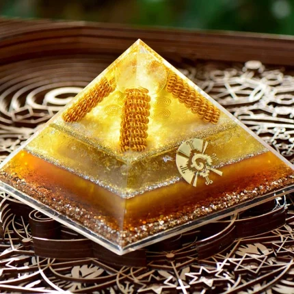 Orgonite crystal pyramid channeling cosmic intelligence, Hunab Ku energy, and universal balance.