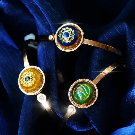 Orgone energy bracelet with Eye of Horus symbol and gemstone crystal to attract wealth, success, and balance energy.