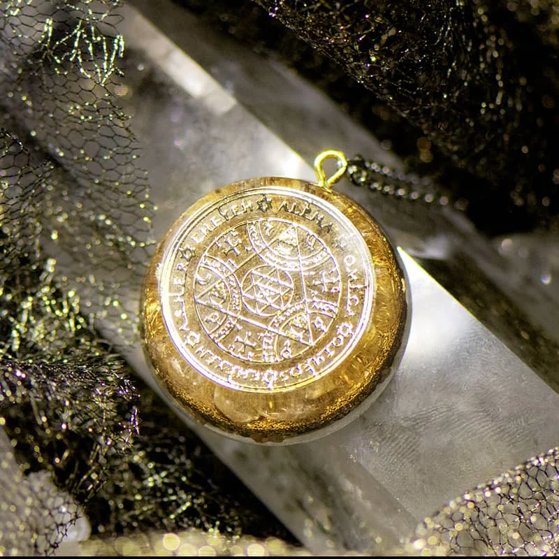 Seal-of-Solomon-Orgonite-Crystal-Necklace-with-Sacred-Geometry-Symbol Seal of Solomon Orgonite Crystal Necklace with Sacred Geometry symbols and Golden Rutilated Quartz for energy balance and abundance.