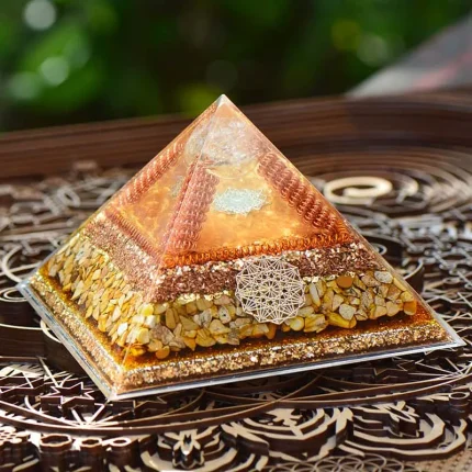 Sacred Geometry Art-Inspired Orgone Pyramid with crystal and sacred symbols for reiki, wisdom, and healing power.