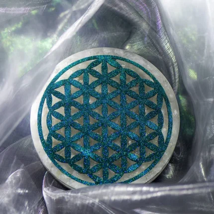 Clear Quartz Crystal Energy Plate featuring the Flower of Life symbol for healing and renewal