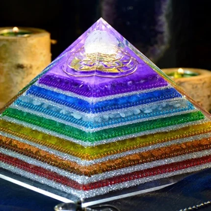 Large orgonite pyramid with amethyst and aventurine crystals for chakra balancing, orgonite healing, and emotional well-being in meditation.
