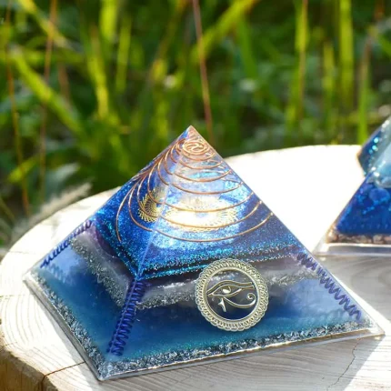 Eye of Horus Chakra Balancing Crystal Pyramid for clearing negative energy and strengthening insight.
