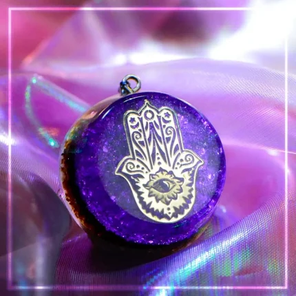 hand of fatima or hamsa hand orgonite necklace with crystal for energy amulet
